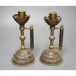 A pair of Gothic brass stem cup and handled candlesticks - 19.5cm high