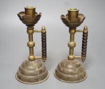 A pair of Gothic brass stem cup and handled candlesticks - 19.5cm high
