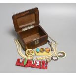 A Victorian pinchbeck and paste set brooch and a group of assorted costume jewellery including