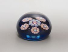 A small Perthshire blue ground millefiori glass paperweight - 6cm diameter