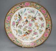 A 19th century Chinese famille rose birds insects fruit and flowers dish - 35cm diameter