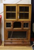 An early 20th century oak Globe Wernicke style four section oak bookcase, length 88cm, depth 36cm,