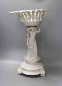 A Continental white glazed porcelain centrepiece bowl modelled with two maidens - 47cm tall