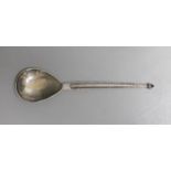 A George V Arts & Crafts silver spoon by The Artificers' Guild Ltd, with planished bowl, 15.7cm,