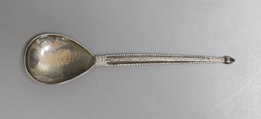 A George V Arts & Crafts silver spoon by The Artificers' Guild Ltd, with planished bowl, 15.7cm,