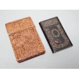 A 19th century Chinese tortoiseshell card case and a similar carved sandalwood card case, 11 cms