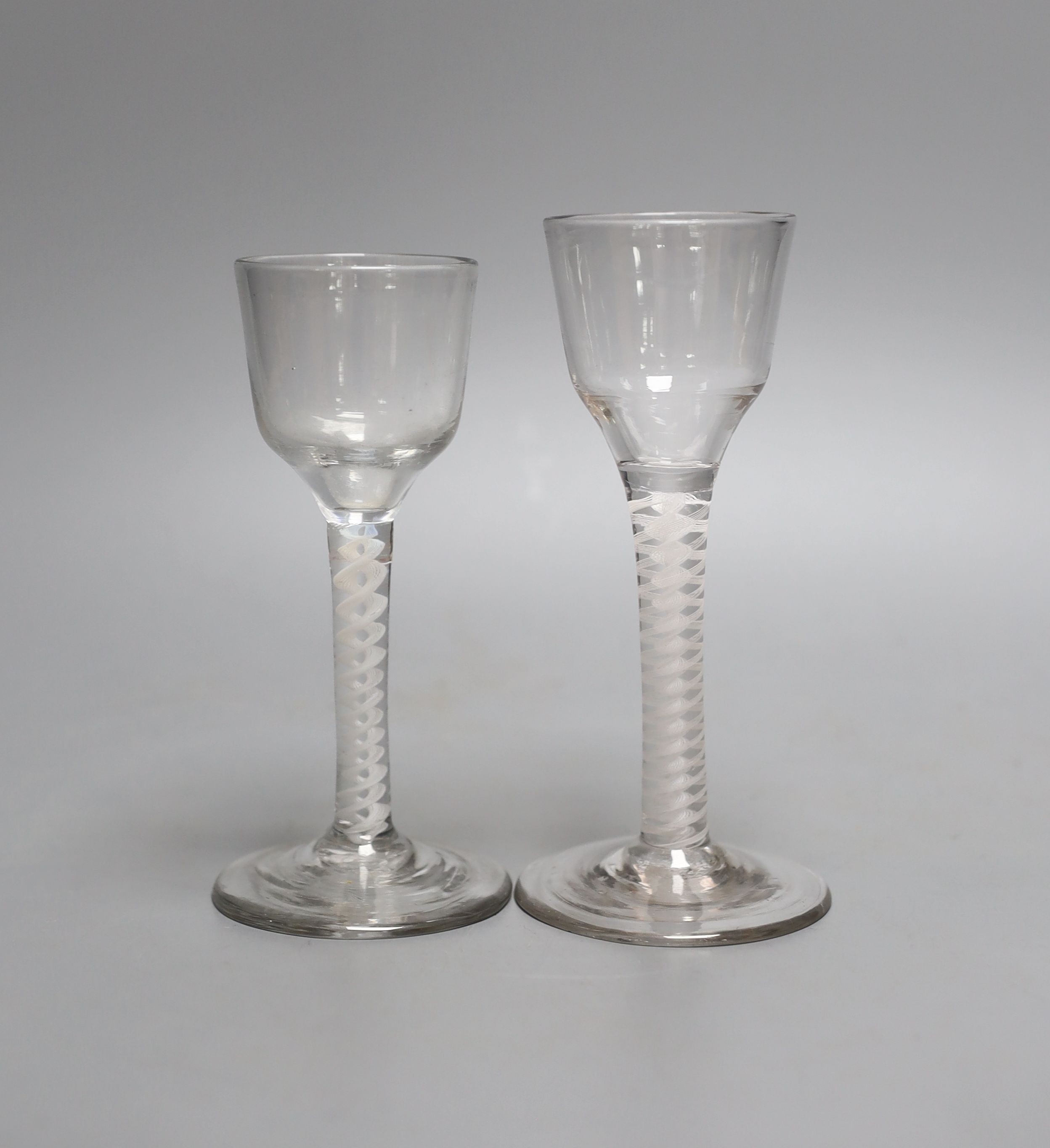 Two Georgian opaque twist cordials - tallest 14.5cm