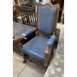 A Carolean style oak upholstered open armchair, width 65cm, depth 55cm, height 118cm