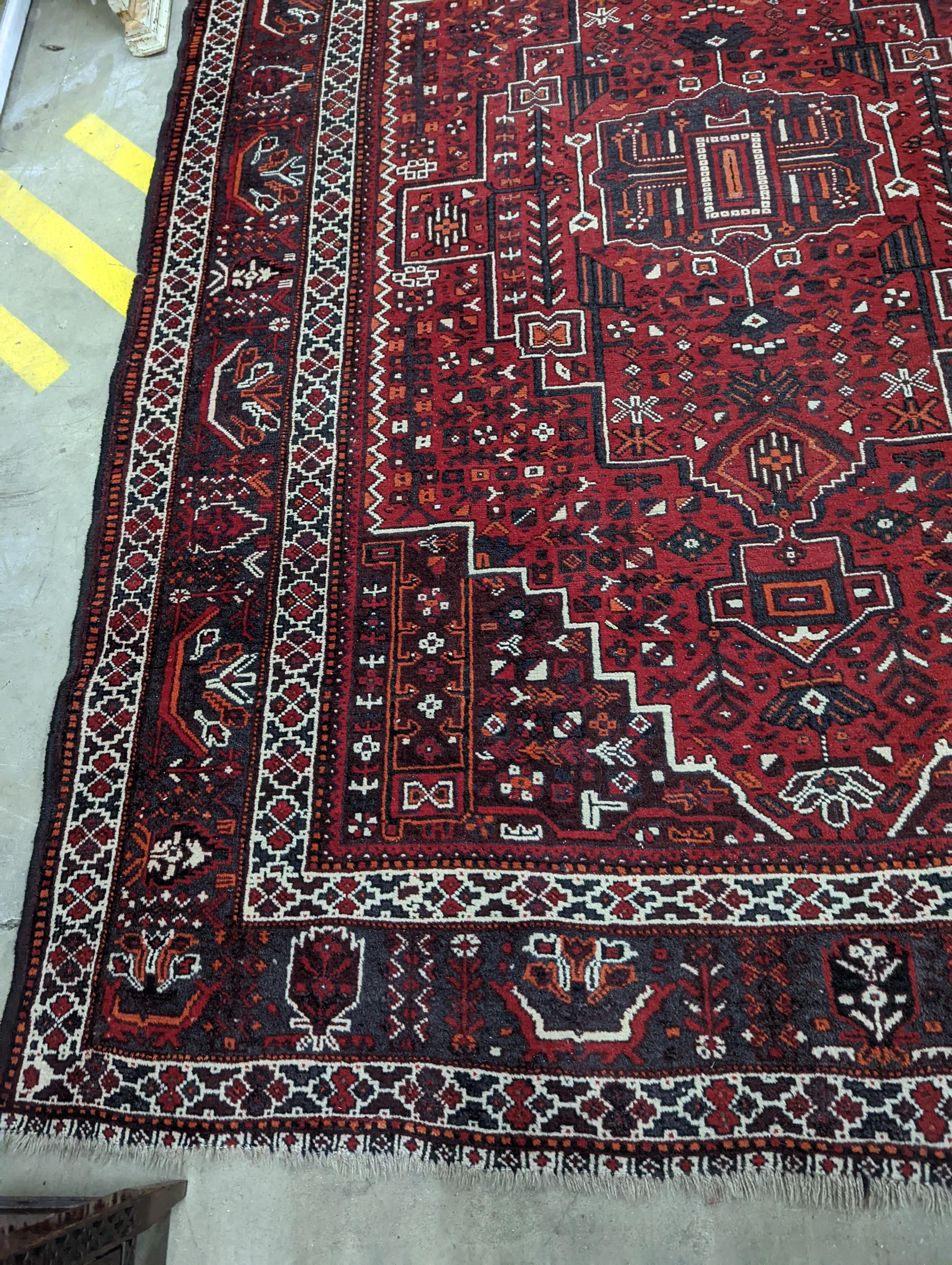 A Caucasian design burgundy ground carpet, 280 x 210cm - Image 3 of 12
