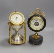 An ormolu and silver plated hourglass shaped desk aneroid barometer and a gilt metal and parcel