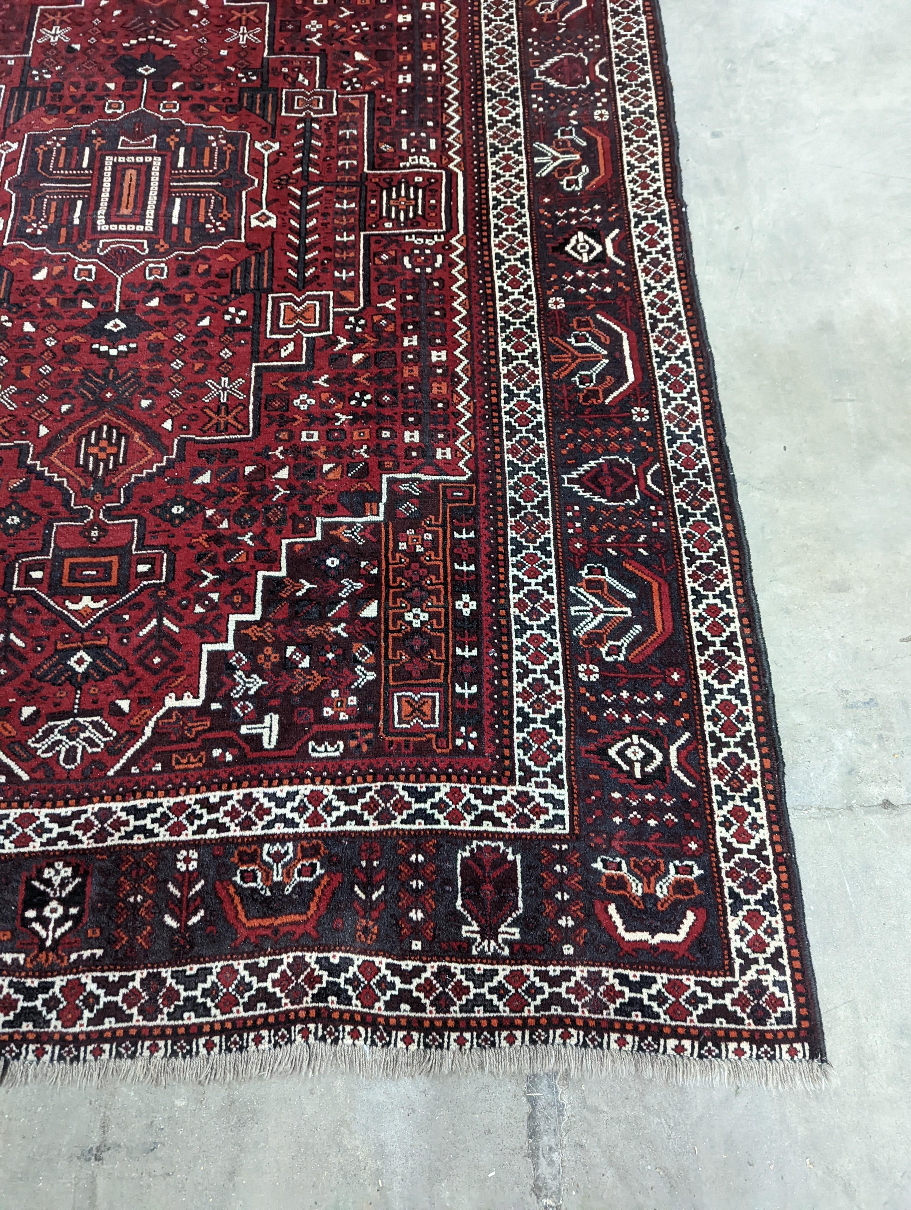 A Caucasian design burgundy ground carpet, 280 x 210cm - Image 2 of 12