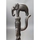 A late 19th/early 20th century Ceylonese carved ebony ‘elephant’ walking stick, 90cm