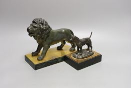 A bronze of a lion on marble base together with a bronze of a sporting dog. Longest 23cm