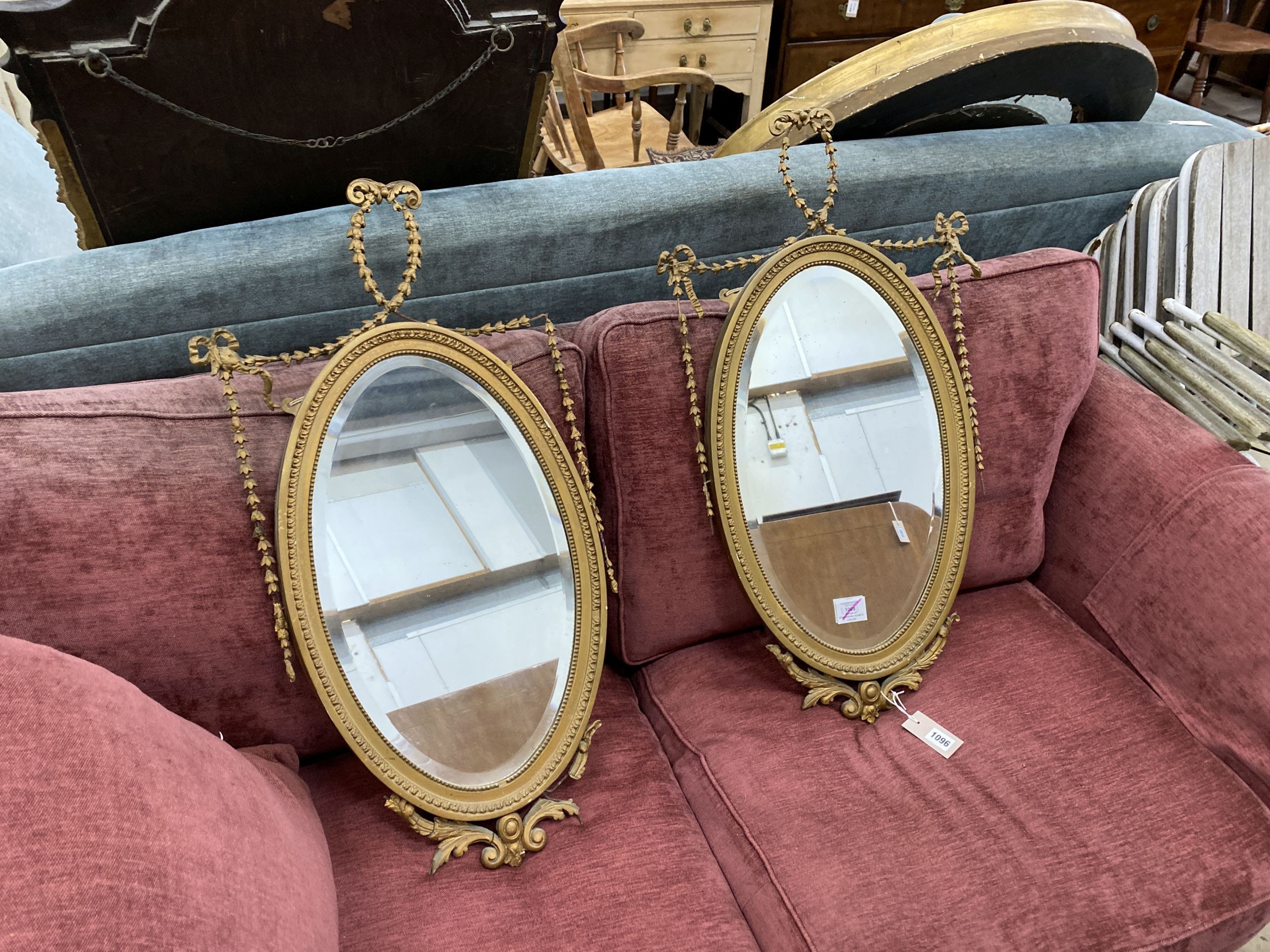 A pair of Edwardian Adam design oval giltwood and gesso wall mirrors, width 43cm, height 80cm - Image 6 of 6