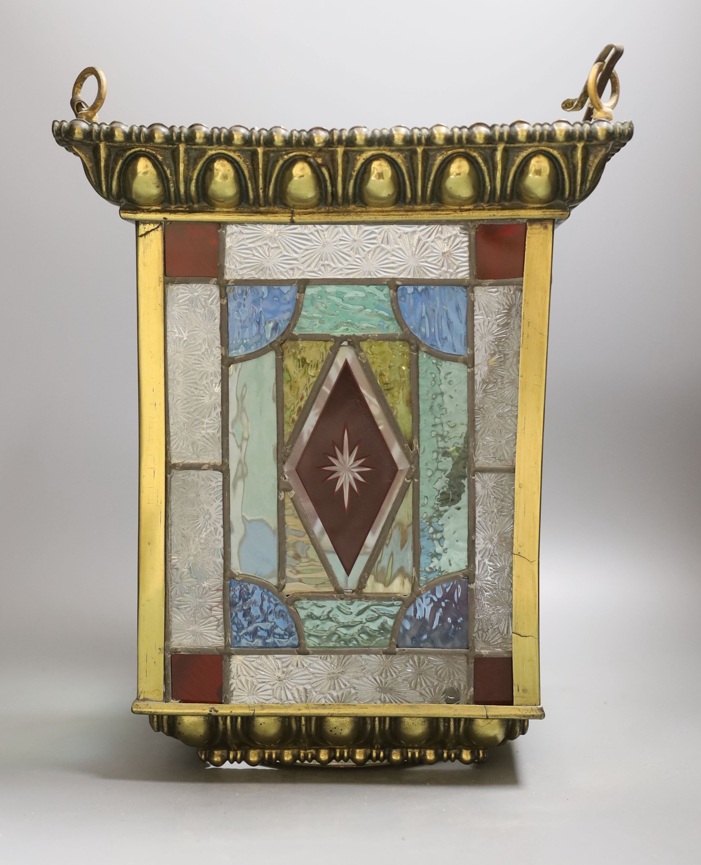 A stained glass and brass hanging hall lantern, 36cm to top of ‘eyes’ - Image 2 of 2