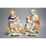 A pair of Victorian Staffordshire child and animal groups - tallest 23.5cm