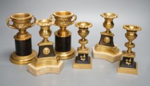 A pair of Louis XVI style ormolu and bronze models of campana urns and two similar pairs of Empire