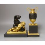 A French style gilt metal ‘urn’ inkstand/pot pourri and similar ‘dog and child’ paperweight. Tallest