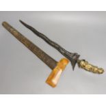 A Fine Balinese dagger kris, 19th century, earlier wavy pamor blade 43cms, later gilt brass