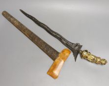 A Fine Balinese dagger kris, 19th century, earlier wavy pamor blade 43cms, later gilt brass