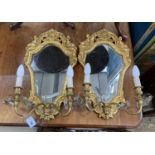 A pair of gilt framed cartouche shaped electric girandoles, width 35cm, height 60cm