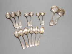 A quantity of silver teaspoons, sifter spoons and condiment spoons, including a set of six coffee