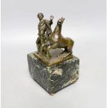 A Roman style bronze of a man and horse on a marble base 17cm