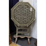 A Damascusware and mother of pearl inlaid octagonal tilt top table, width 50cm, height 66cm