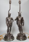 A pair of spelter warrior lamps on marbled plinth base - 62cm high