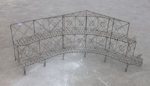 A wirework three tier corner pot stand, width 154cm, depth 180cm, height 68cm