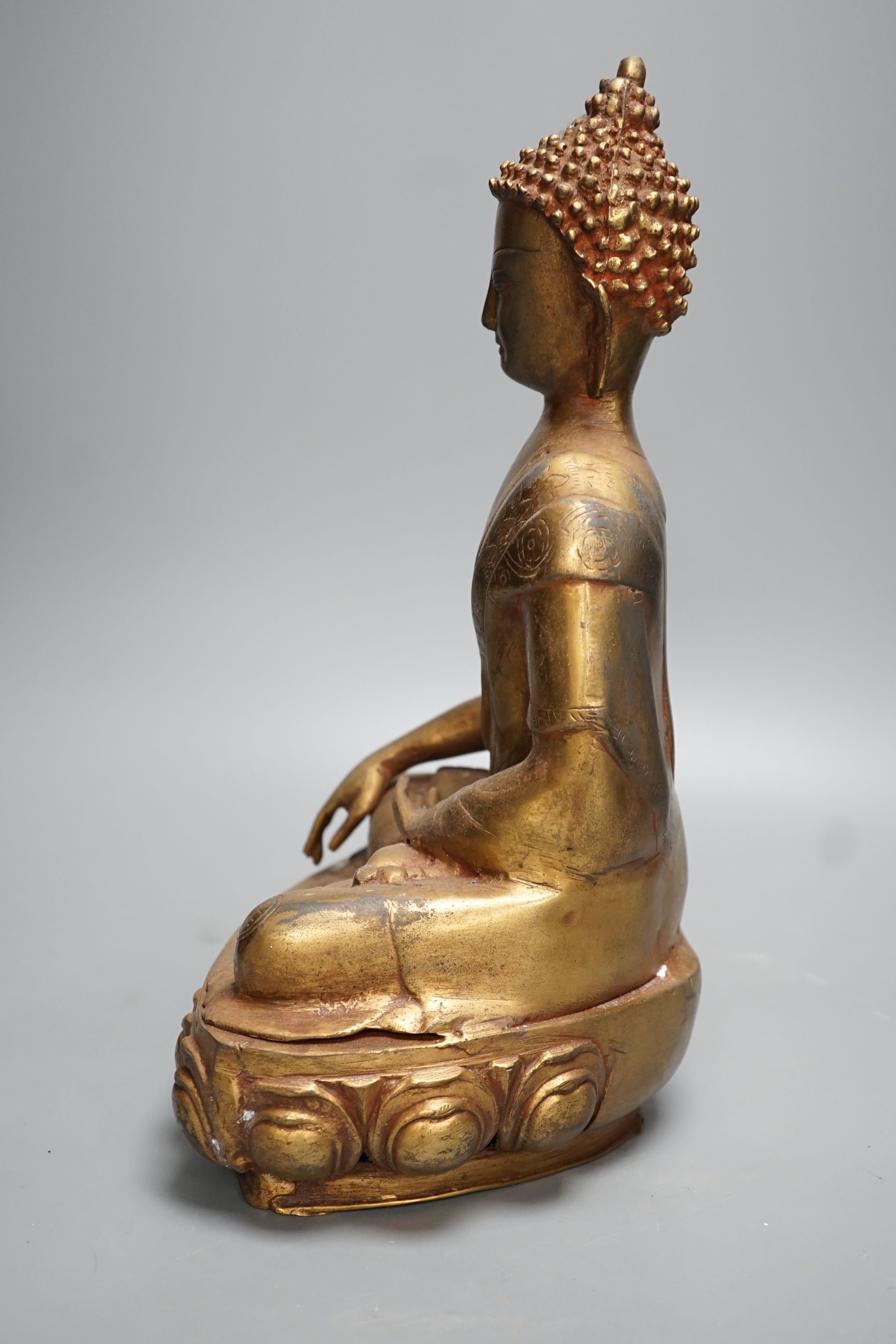 A gilt brass seated figure of Buddha - 38cm high - Image 4 of 4