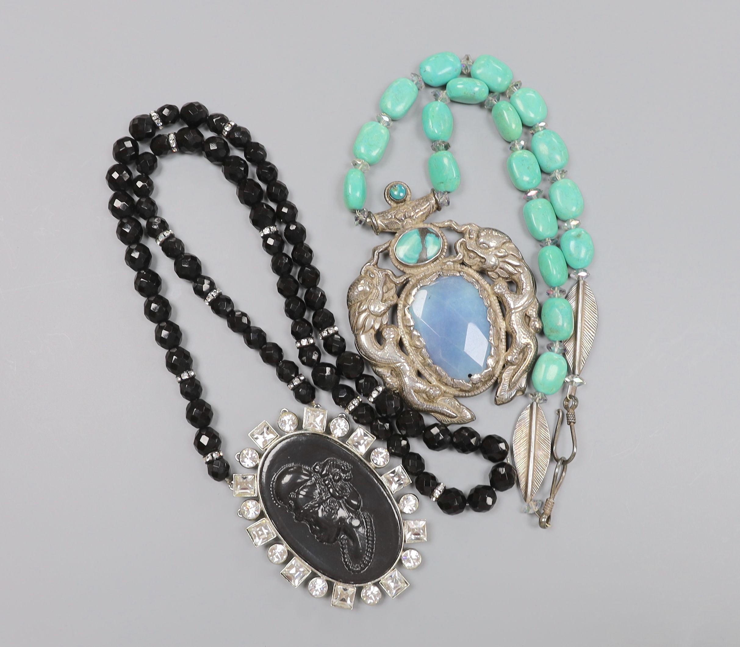 A large 20th century continental white metal, blue quartz and turquoise set drop necklace, 76cm