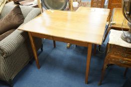 A small 19th century French provincial rectangular cherry kitchen table with fitted drawer, width
