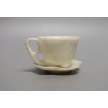 A White hardstone tea cup and saucer - 5cm tall