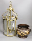 A three light brass lantern and a Japanese bronze jardiniere