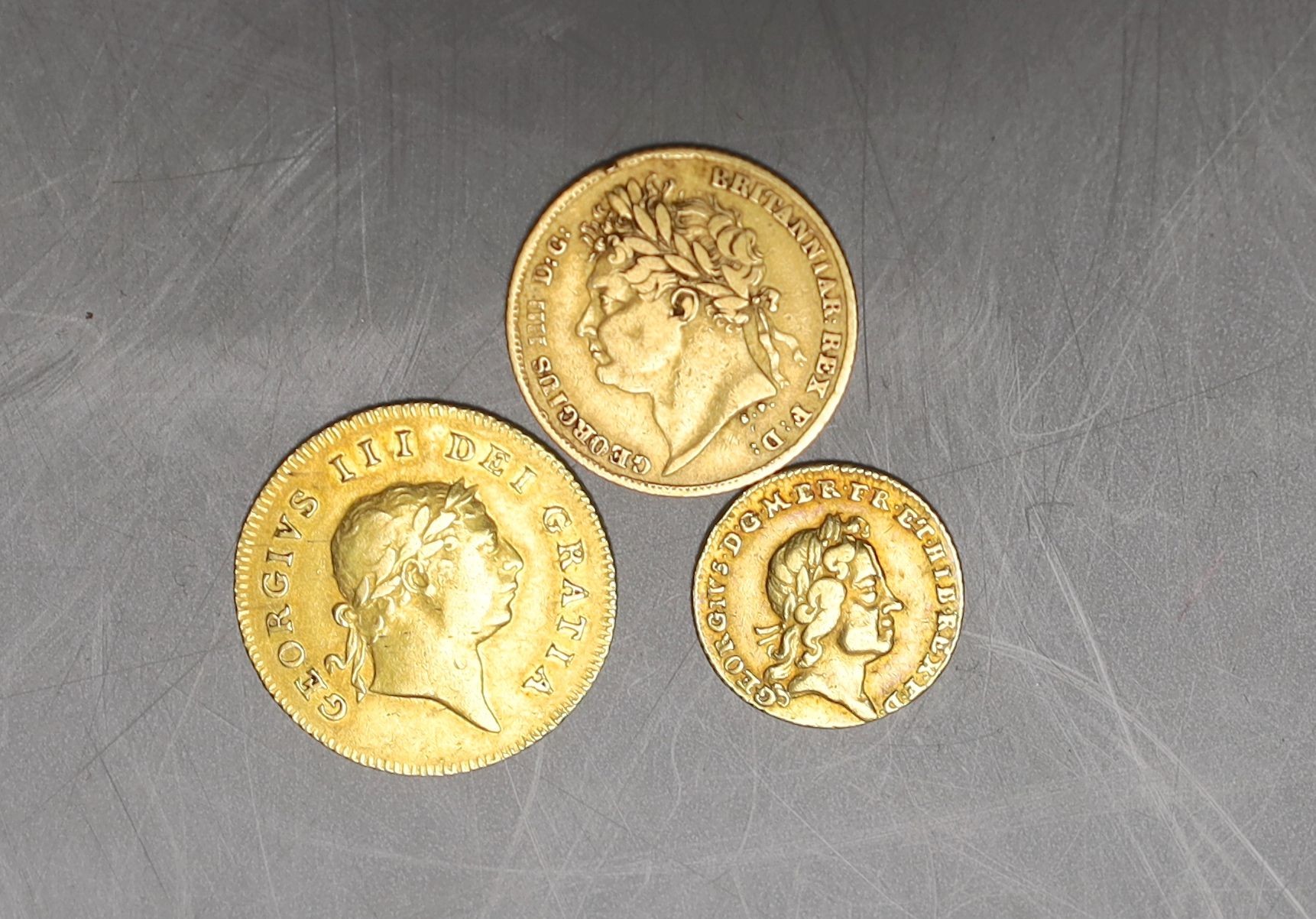 A George III half guinea 1806, good F, a George IV half sovereign 1825, about F, and a George I - Image 2 of 2