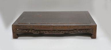 A 19th century Chinese hongmu low stand - 51cm long