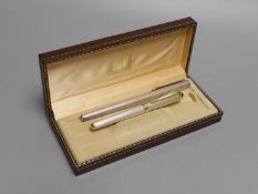 A boxed Dunhill fountain pen together with another fountain pen,