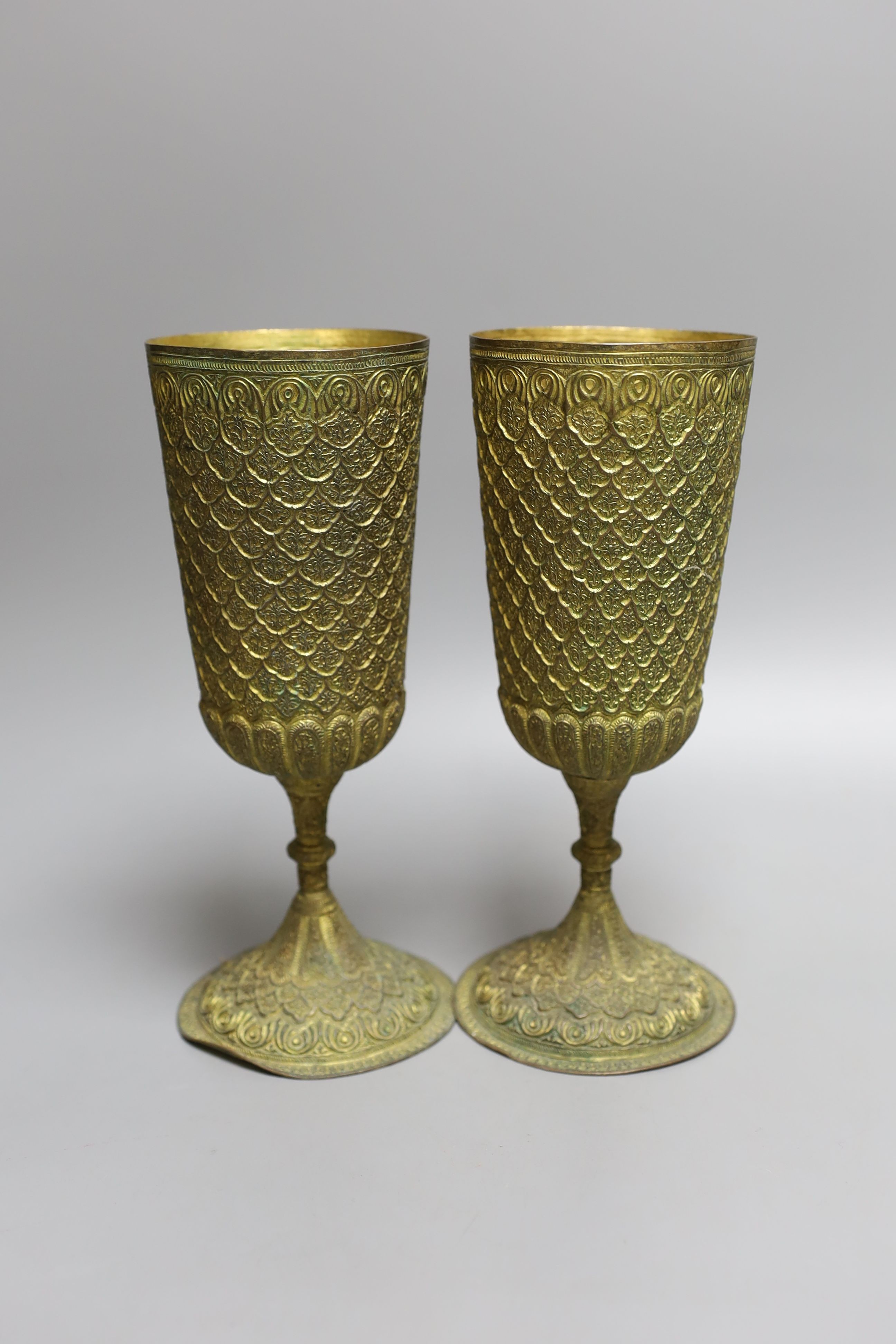 A pair of ornate gilt metal goblets,22cms high. - Image 2 of 4