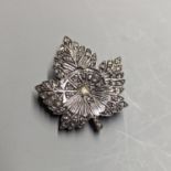 An early 20th century yellow and white metal, rose cut diamond set leaf brooch, 29mm, gross 7.4