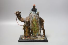 A cold painted metal ‘rug sellers and camel’ table lighter in Bergman style 19cm