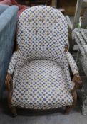 A Victorian walnut spoon back open armchair, width 60cm, depth 58cm, height 93cm