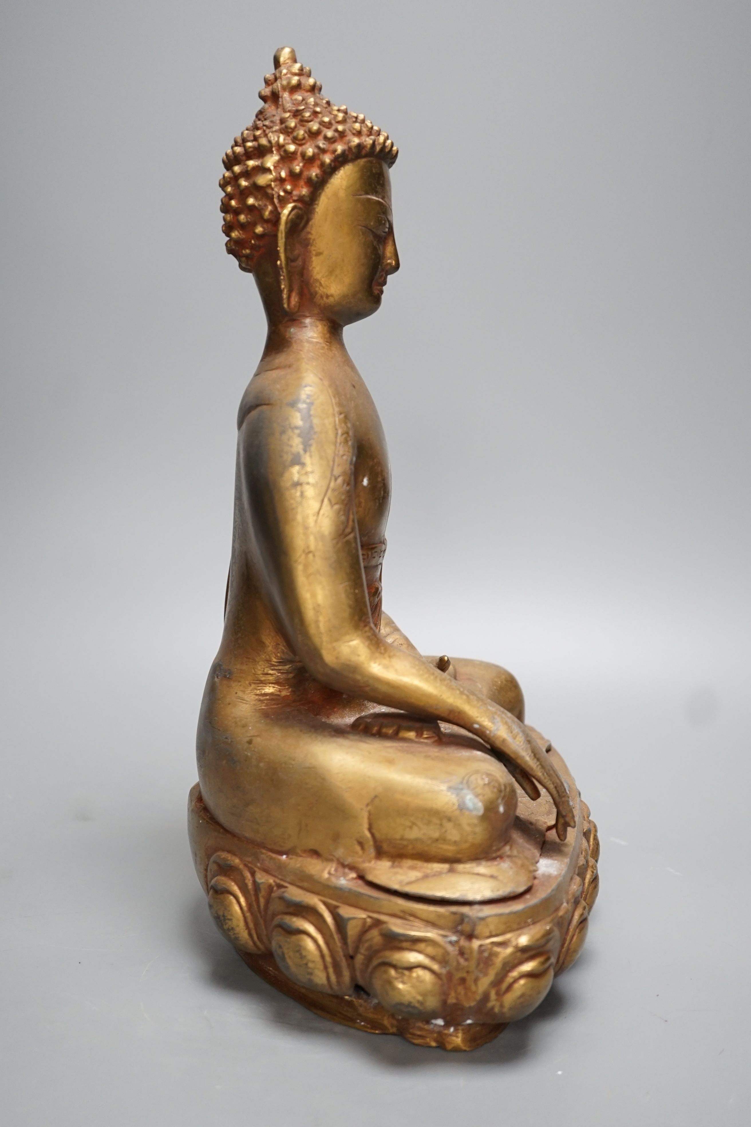 A gilt brass seated figure of Buddha - 38cm high - Image 2 of 4