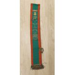 Railway Interest - A metal thread embroidered silk sash inscribed ‘Railway Men of E I S & W, Broad