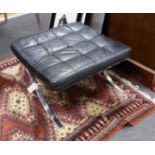 A Barcelona style black leather and chrome footstool, length 64cm, depth 57cm, height 37cm