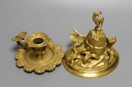 An ormolu mountainous and figurative inkstand and butterfly handled chamber stick,Inkwell 13cms