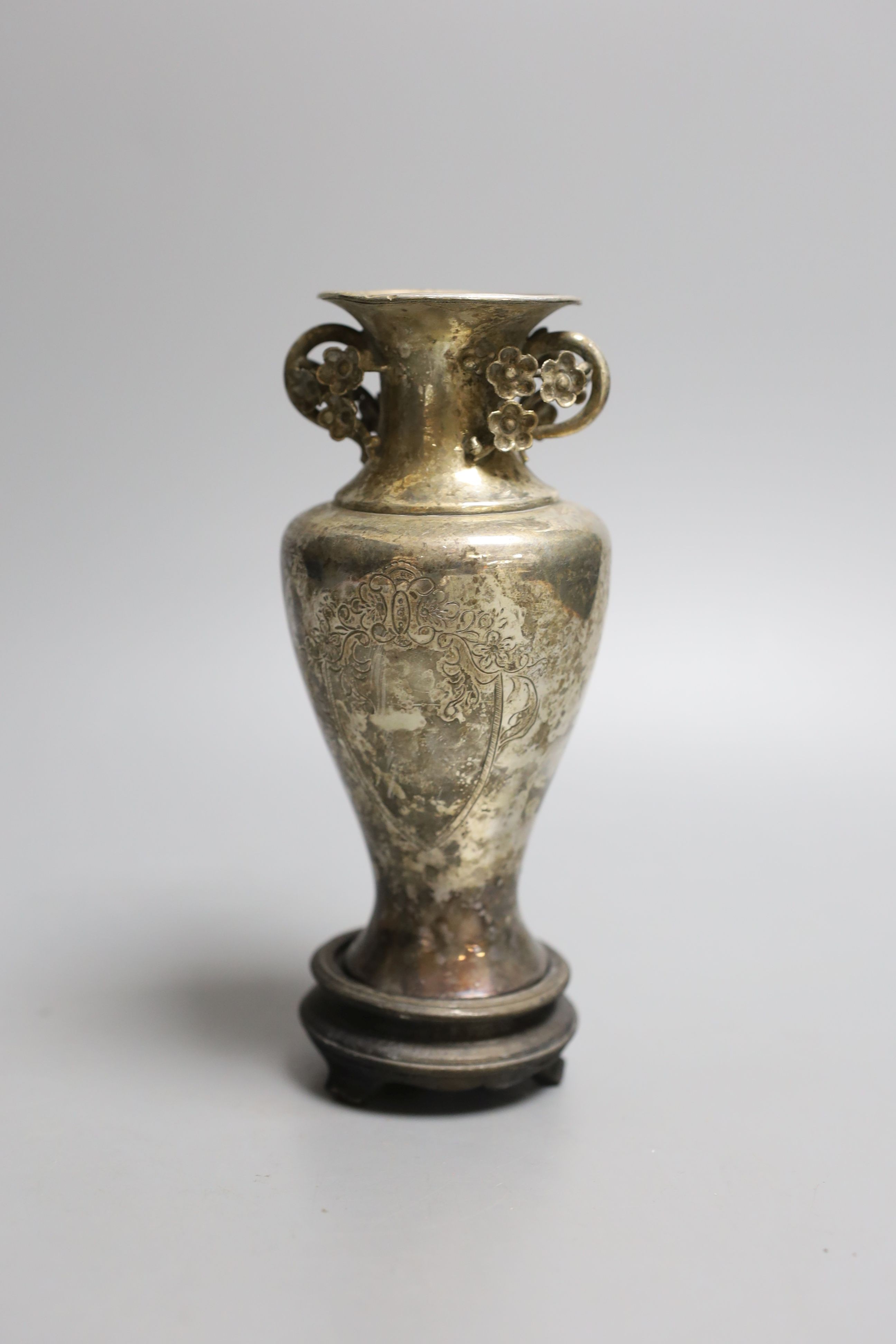 An early 20th century Chines engraved white metal two handled vase, on a wooden stand, vase 13.5cm. - Image 2 of 3