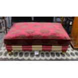 A large Duresta rectangular footstool upholstered in a Chinese style fabric, length 122cm, depth