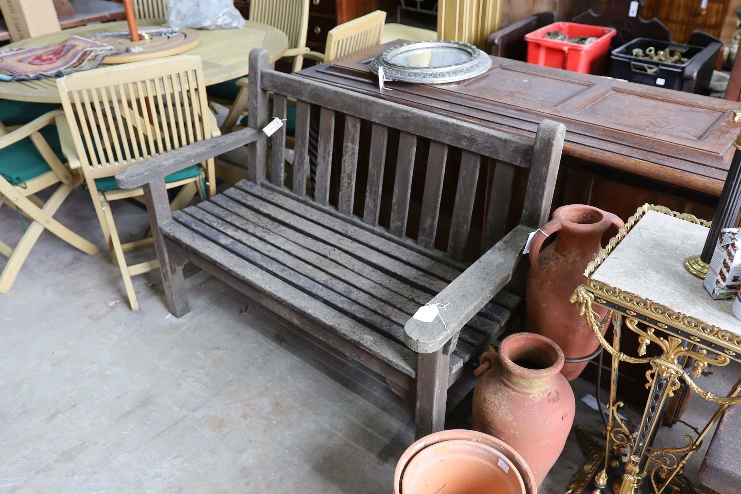 A weathered teak slatted garden bench, length 128cm, depth 62cm, height 91cm - Image 3 of 3