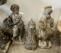 Three reconstituted stone garden ornaments, flower seller, dolphin and heraldic lion, largest height
